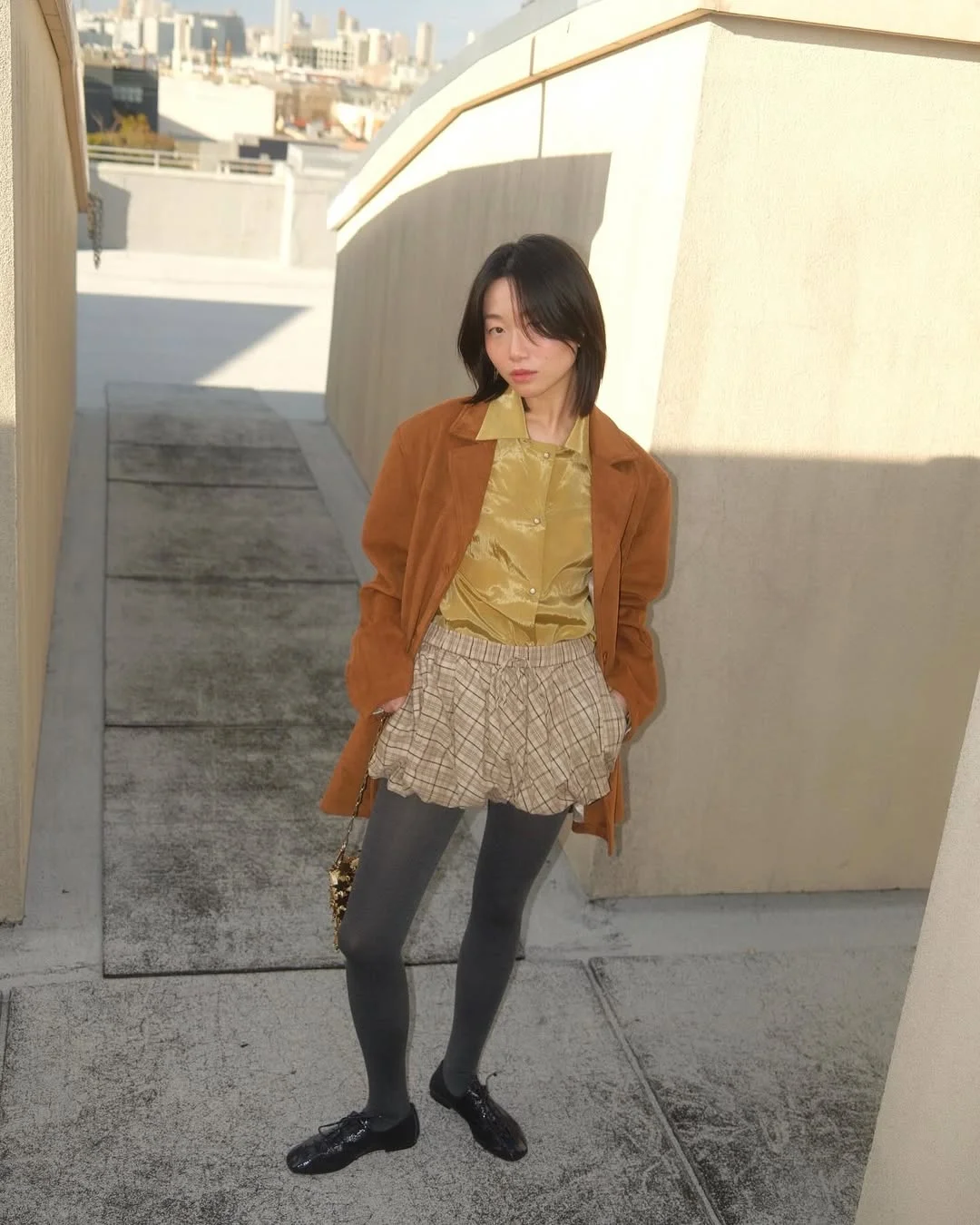 fall outfits with tights 2026 Soft Academia Styling With Plaid Shorts and Grey Tights