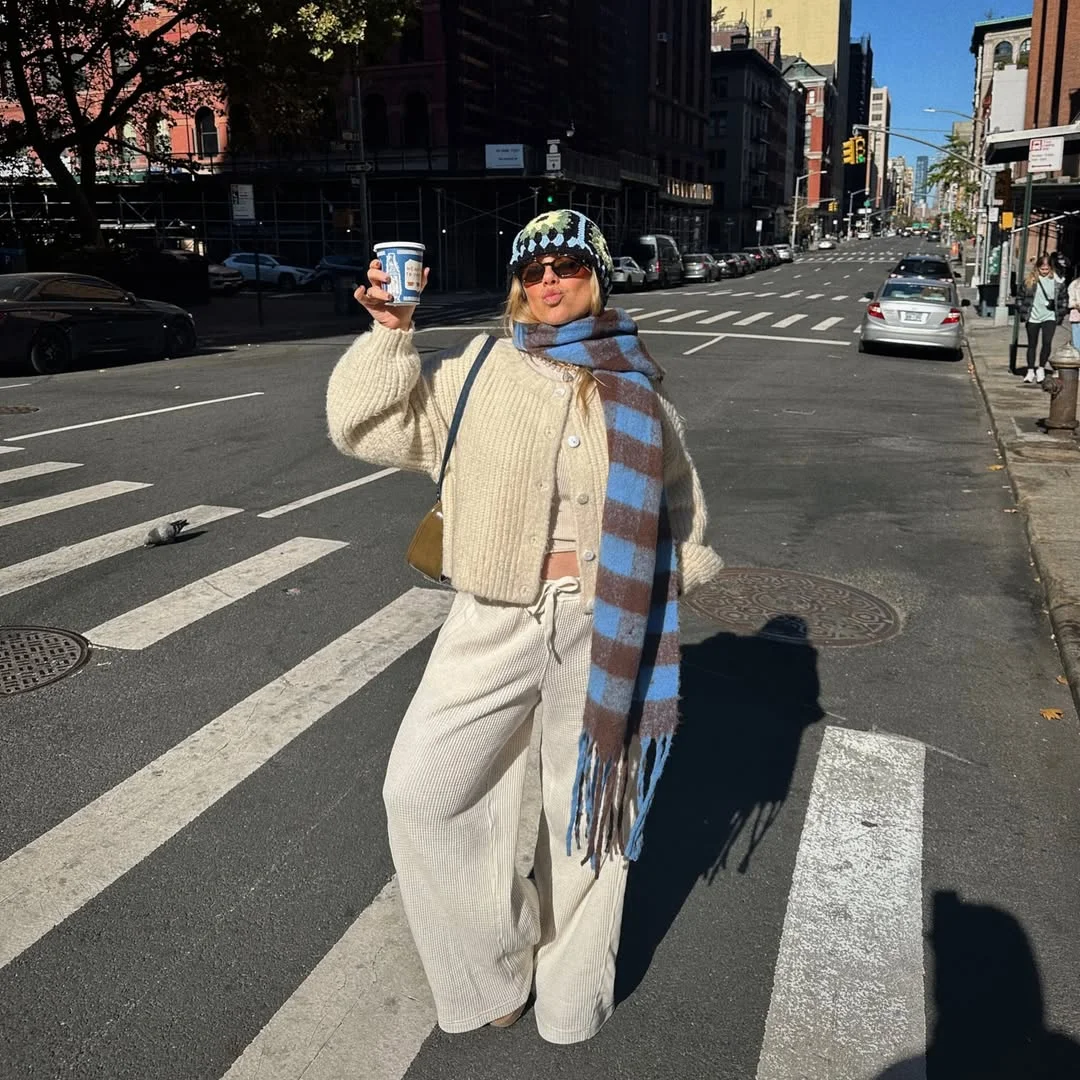fall street style NYC outfits 2026 Oversized Knitwear and Giant Scarves Are Basically NYC Survival Gear