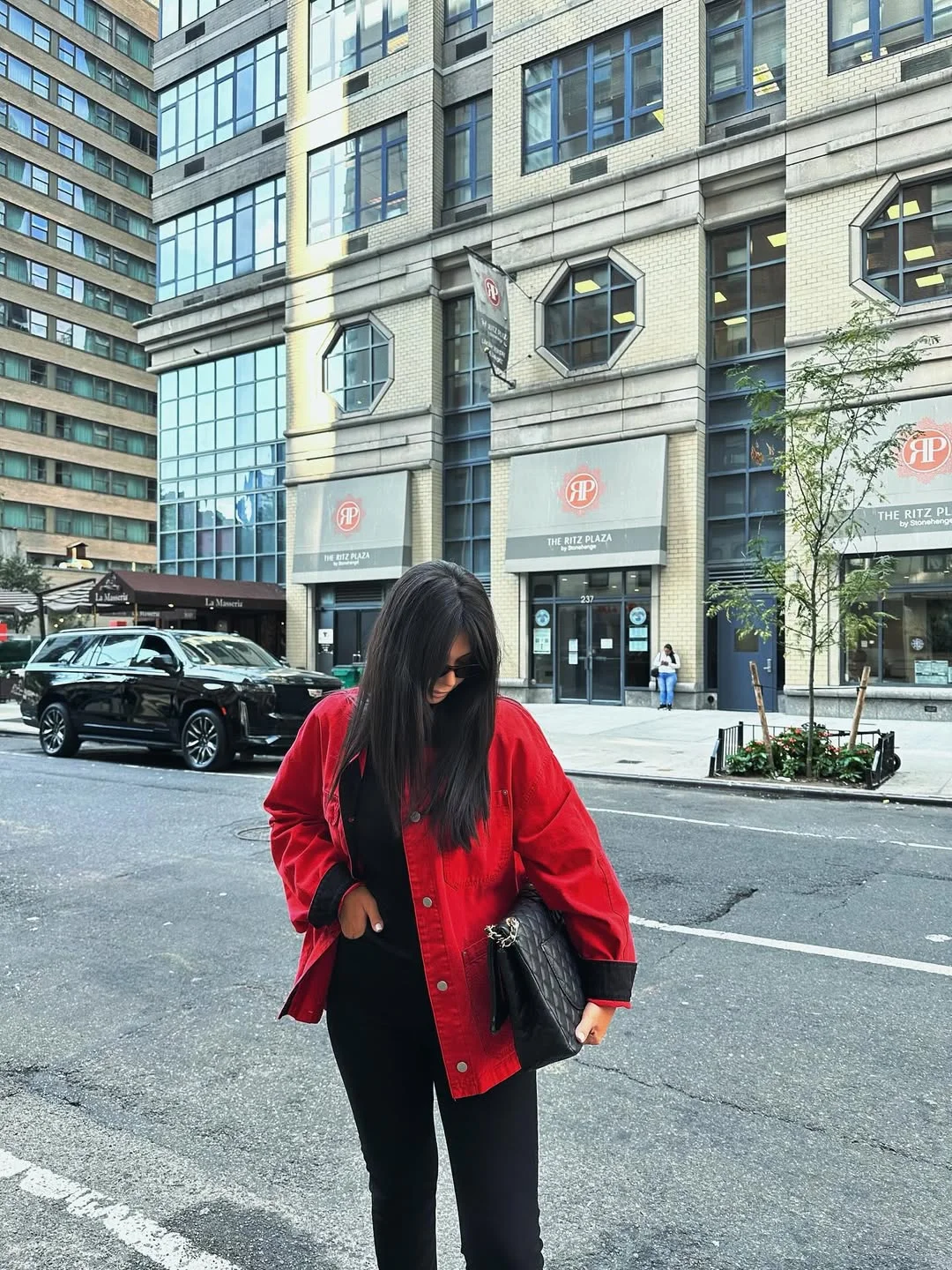 fall street style NYC outfits 2026 Red Outerwear Instantly Changes the Mood of a Simple Black Outfit