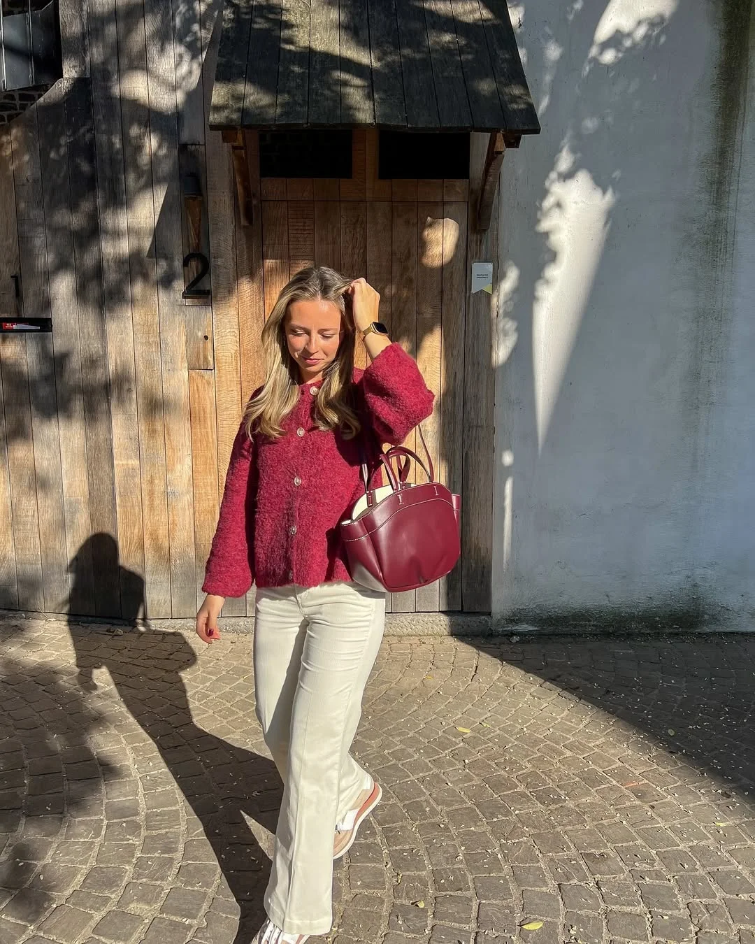 fall street style NYC outfits 2026 Rich Berry Tones Make Soft Knitwear Feel Much More Luxurious