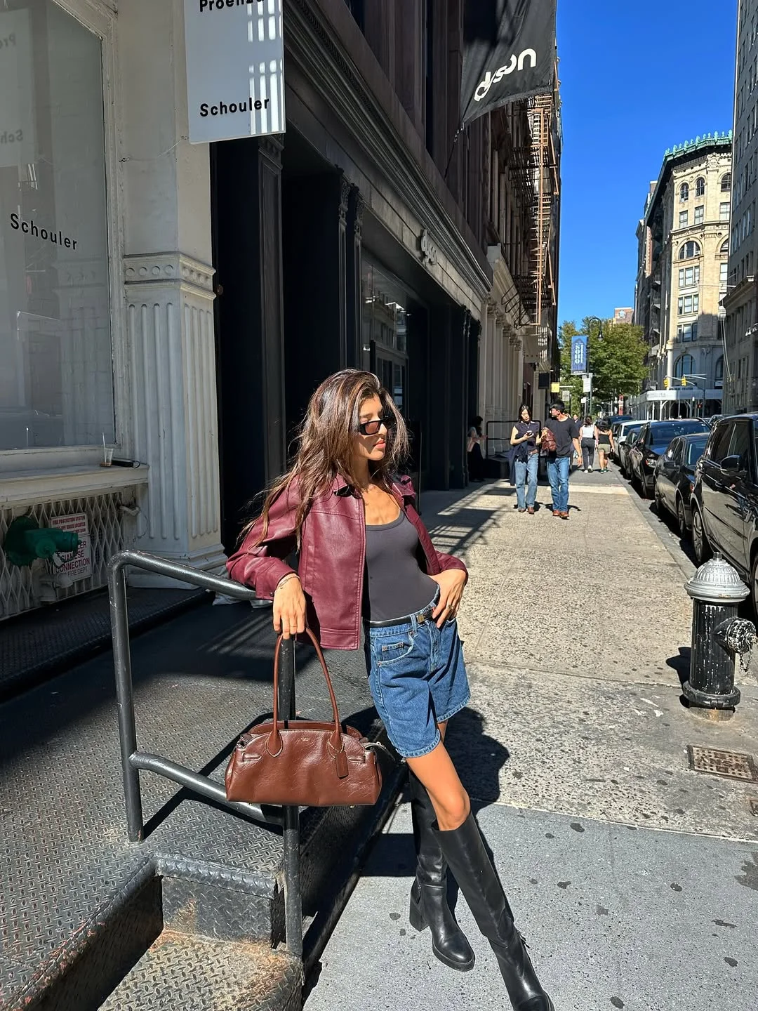 fall street style NYC outfits 2026 Leather Jackets and Tall Boots Are Officially Back in Their Main Character Era