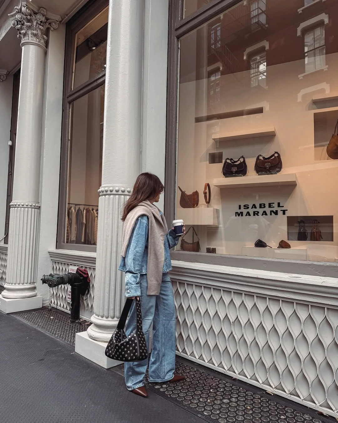 fall travel wardrobe for women 2026 Double Denim Styled with Elegant Knitwear