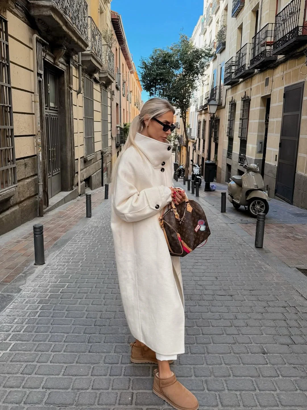 fall travel wardrobe for women 2026 Elegant Monochrome Looks for European Streets