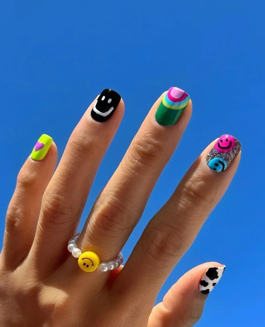 funky summer nails 2026 Smiley Faces Glitter and Pure Festival Fun
