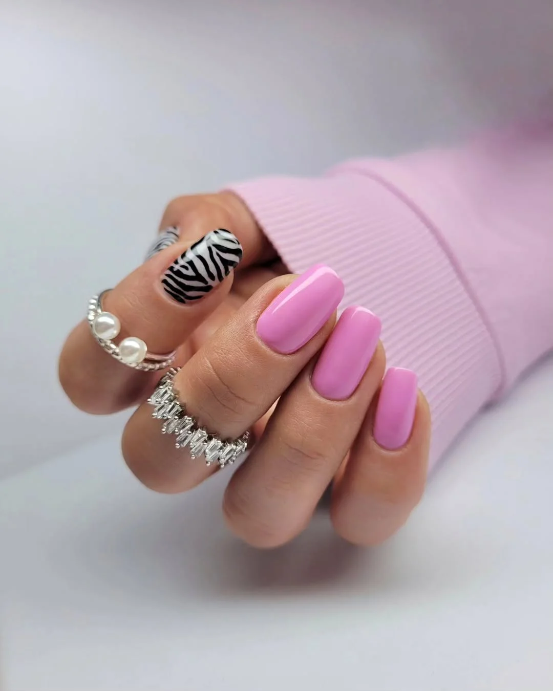 short squoval nails design 2026 Bubblegum Pink with Bold Zebra Contrast