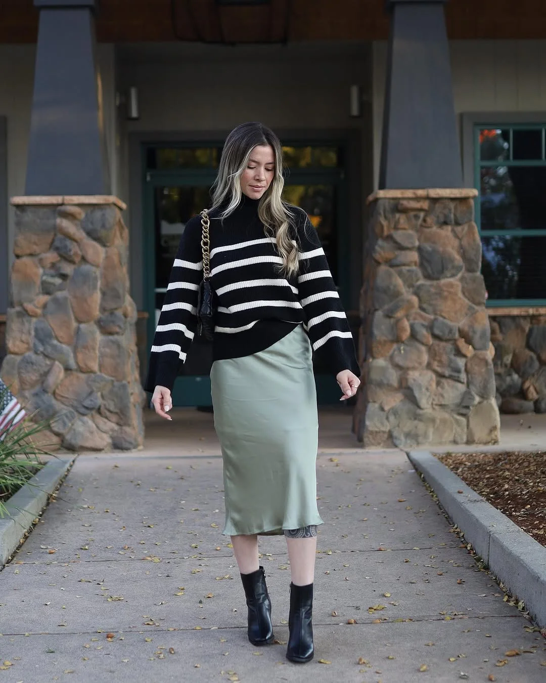 simple fall outfits 2026 Striped Knit Meets a Satin Skirt for Modern Fall Elegance