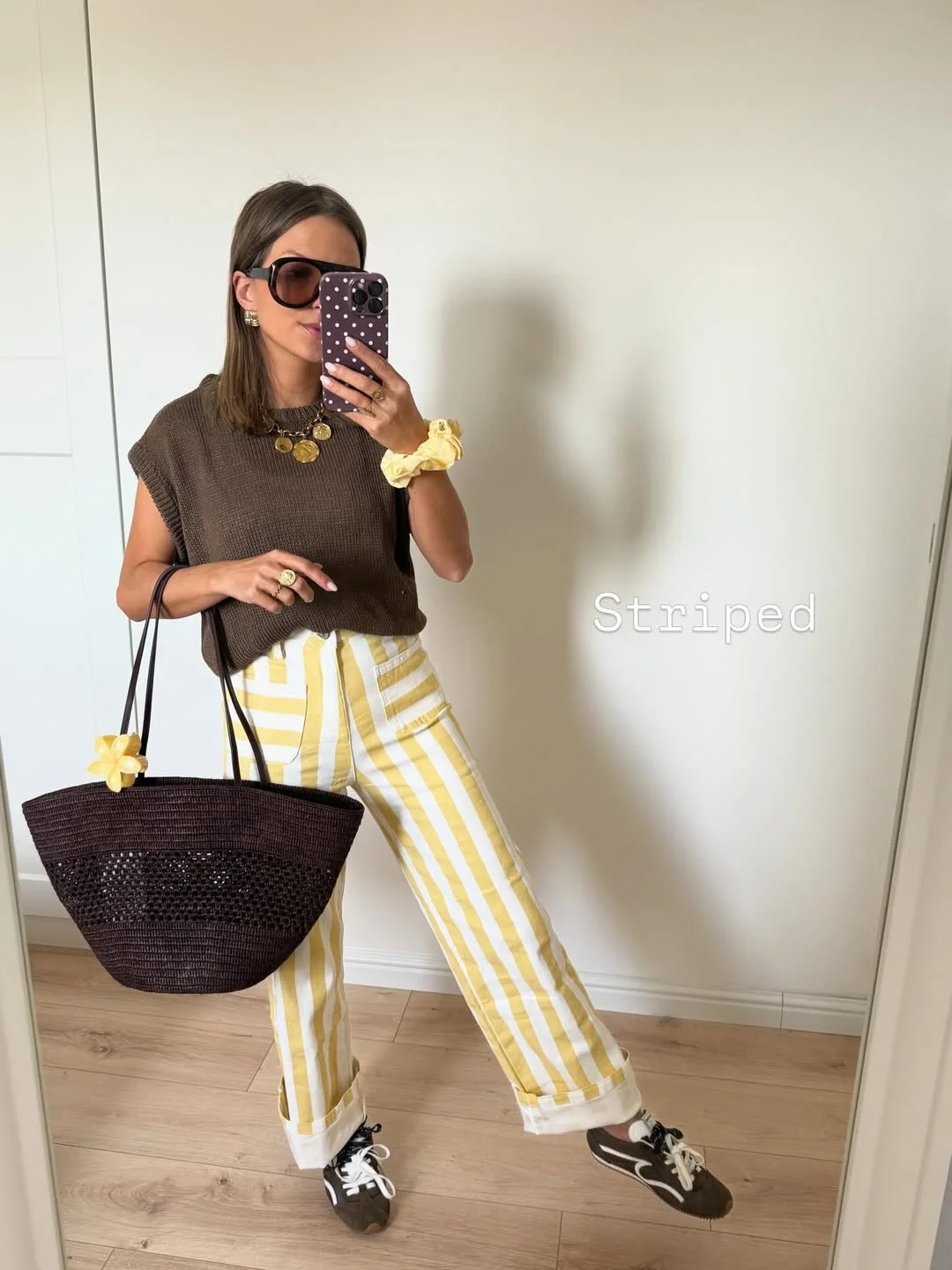 Summer to fall outfits 2026 Striped Trousers And Chocolate Knits Feel Playful In Early Fall