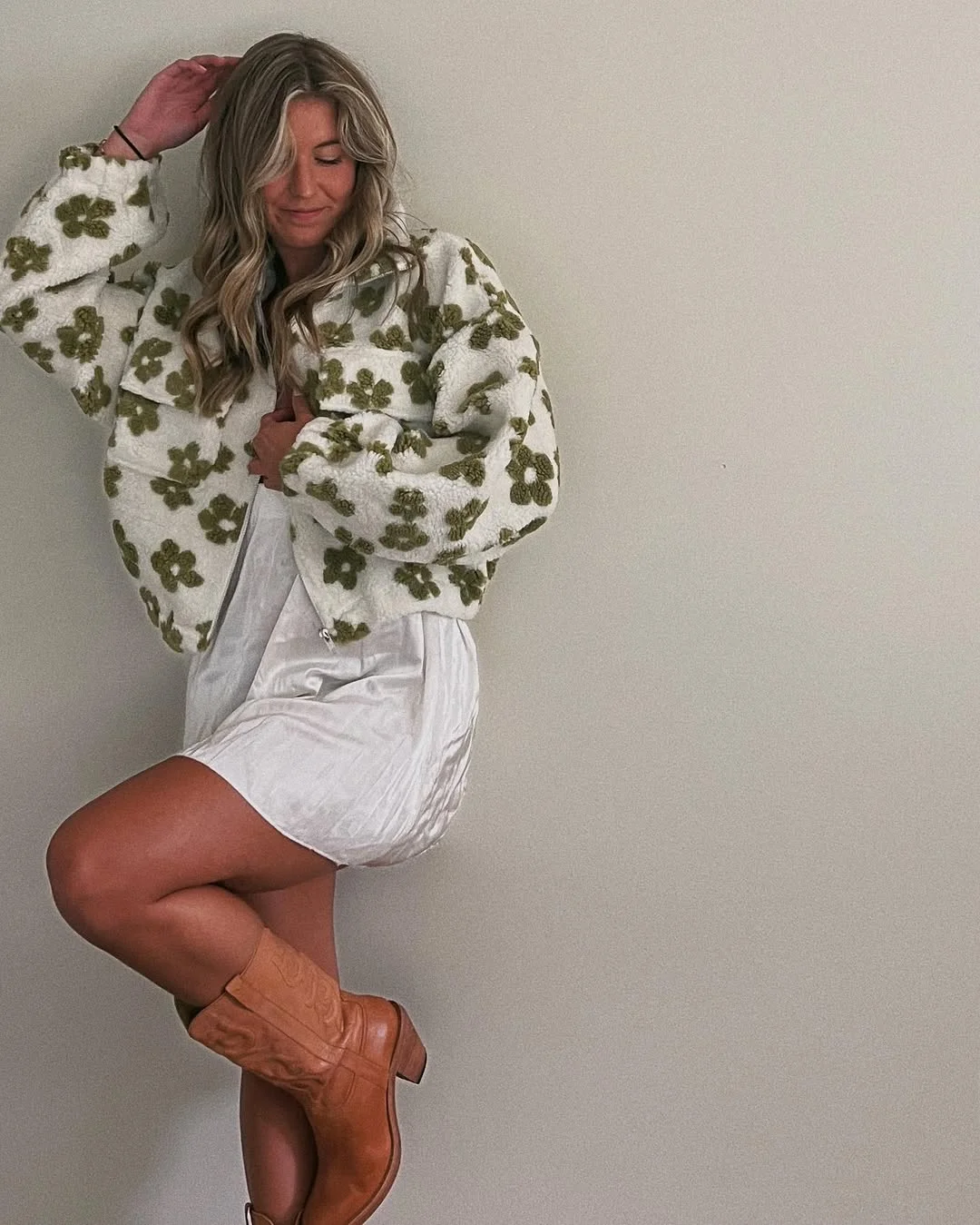 Summer to fall outfits 2026 Floral Sherpa Jackets And Cowboy Boots Create The Coziest Contrast