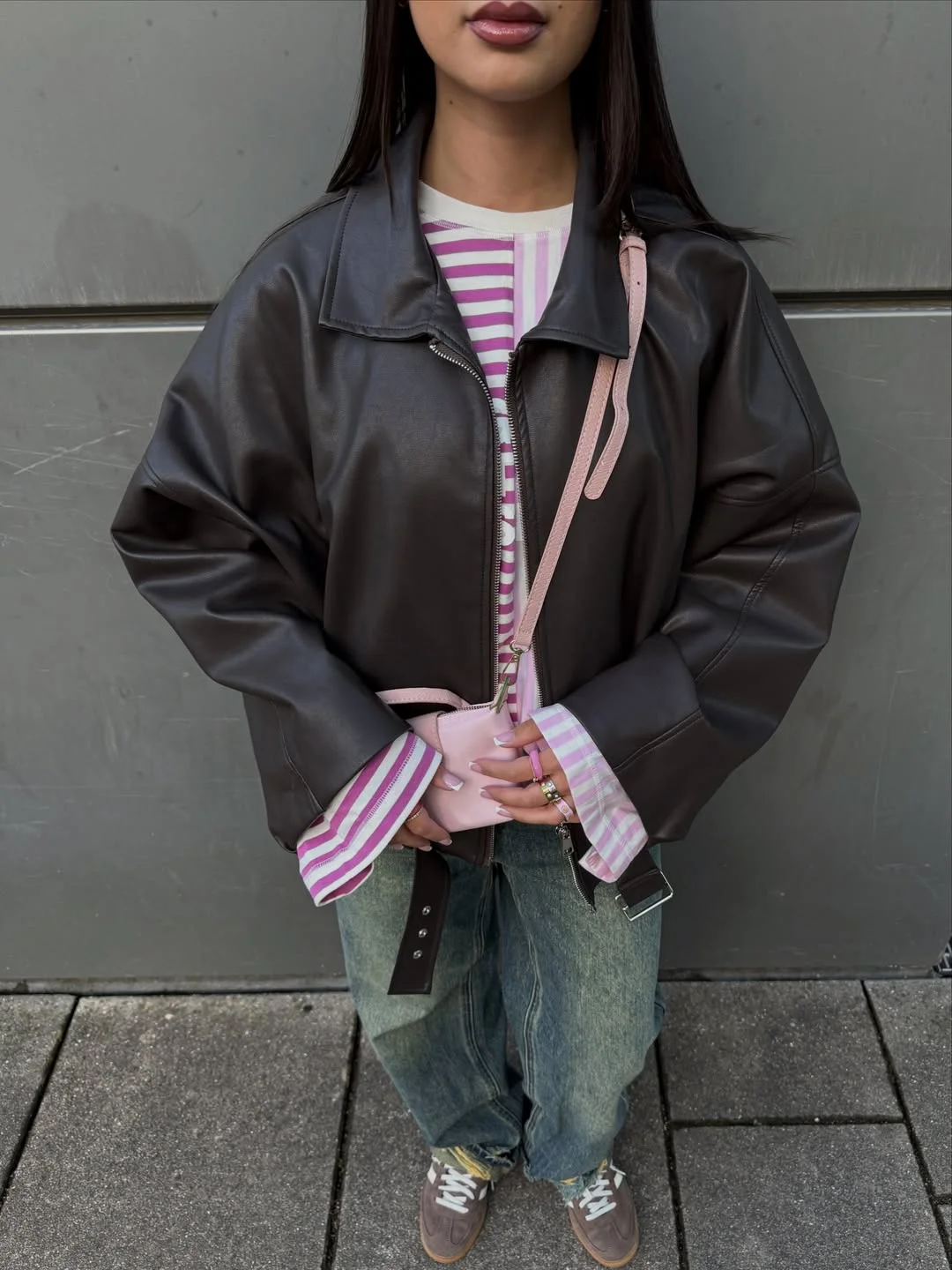 Summer to fall outfits 2026 Leather Jackets And Pink Stripes Add Personality To Fall Basics