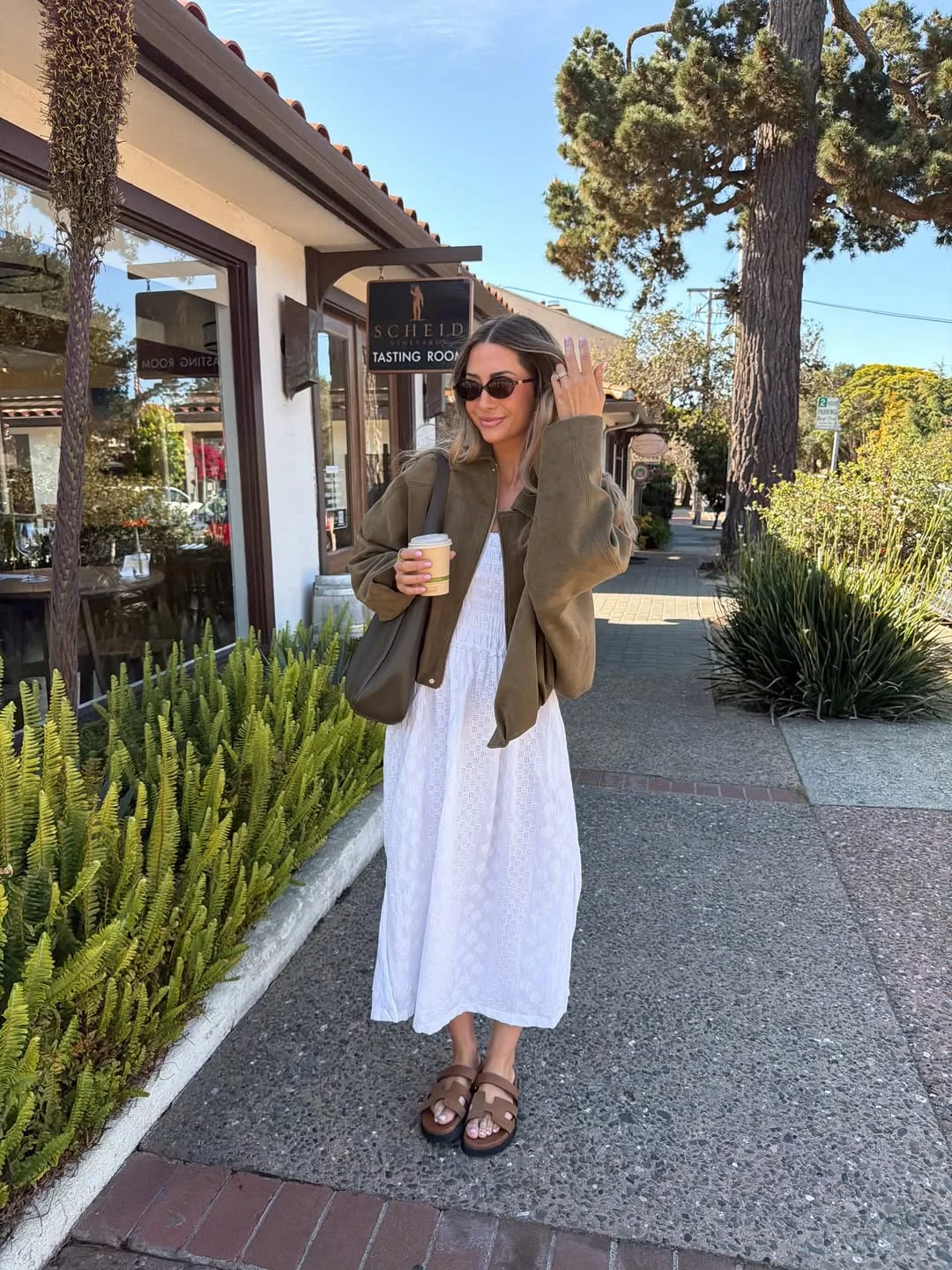 Summer to fall outfits 2026 Soft Olive Layers Over White Dresses Feel Like Early September