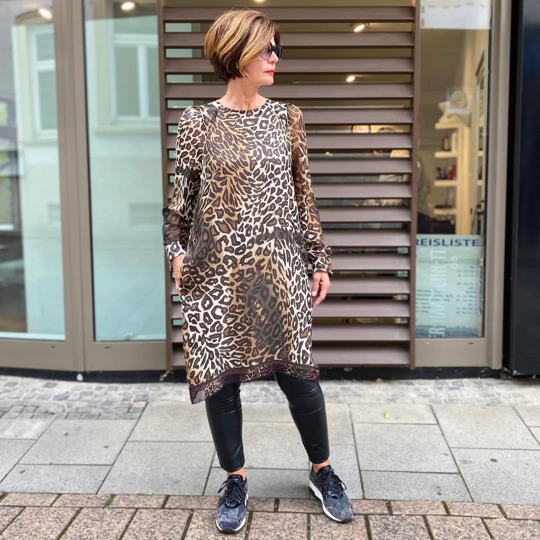 what to wear in fall 2026 over 50 Animal Print with Black Leggings Makes Everyday Dressing Feel Fresh