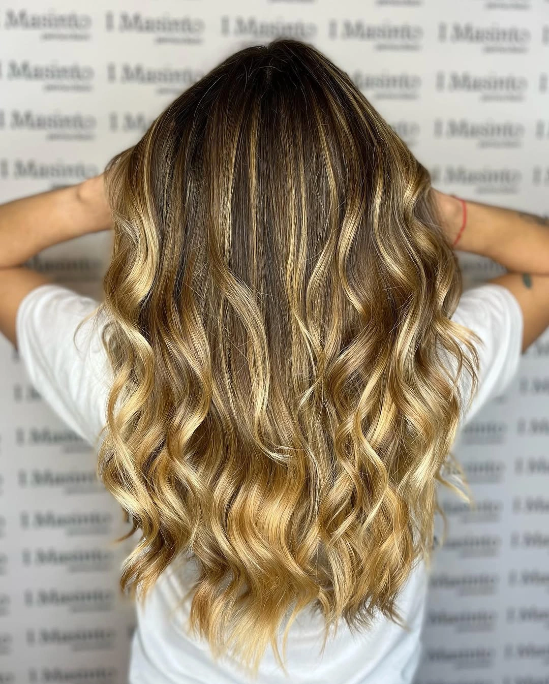 august hairstyles and color ideas 2026 Golden Bronde Waves With Sunlit Dimension