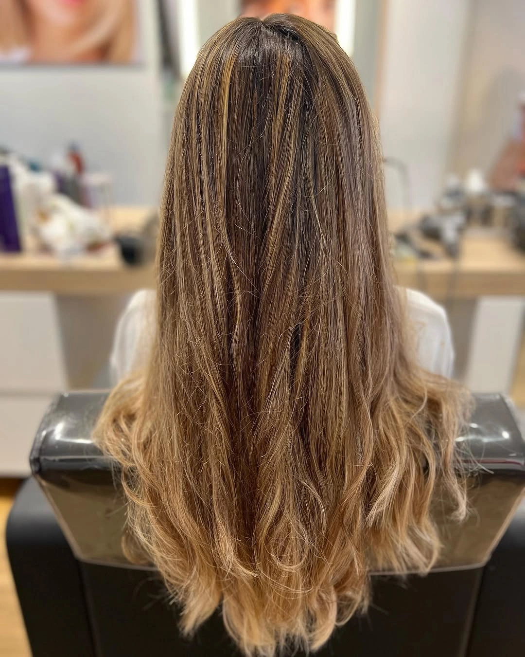 august hairstyles and color ideas 2026 Natural Brunette Length With Fine Sun-Kissed Highlights