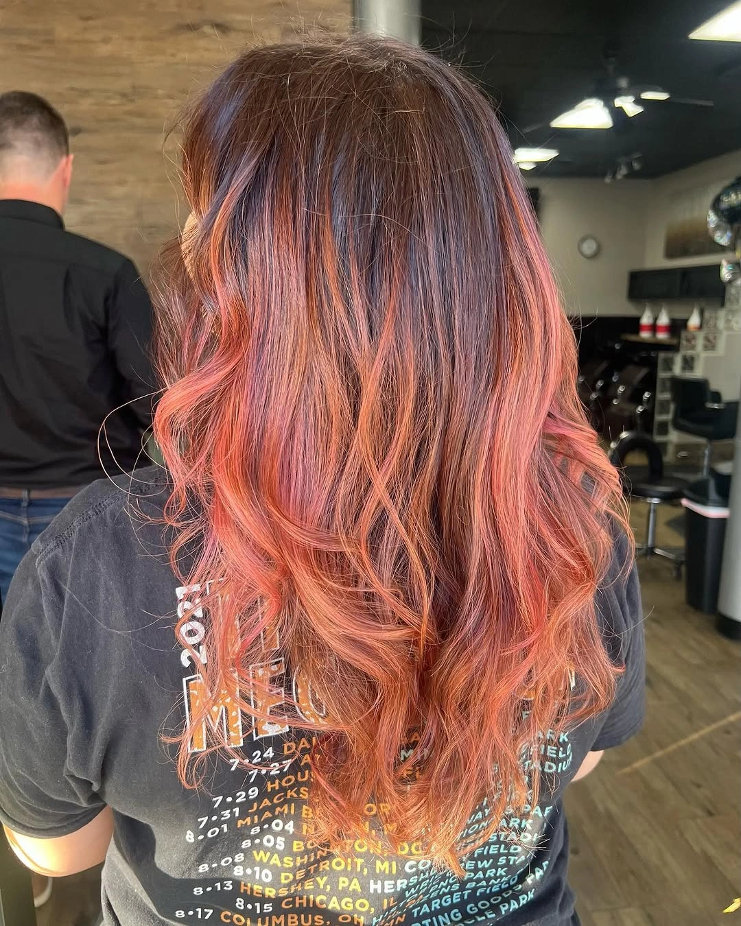 august hairstyles and color ideas 2026 Smoky Brunette Melt With Sunset Peach Ends