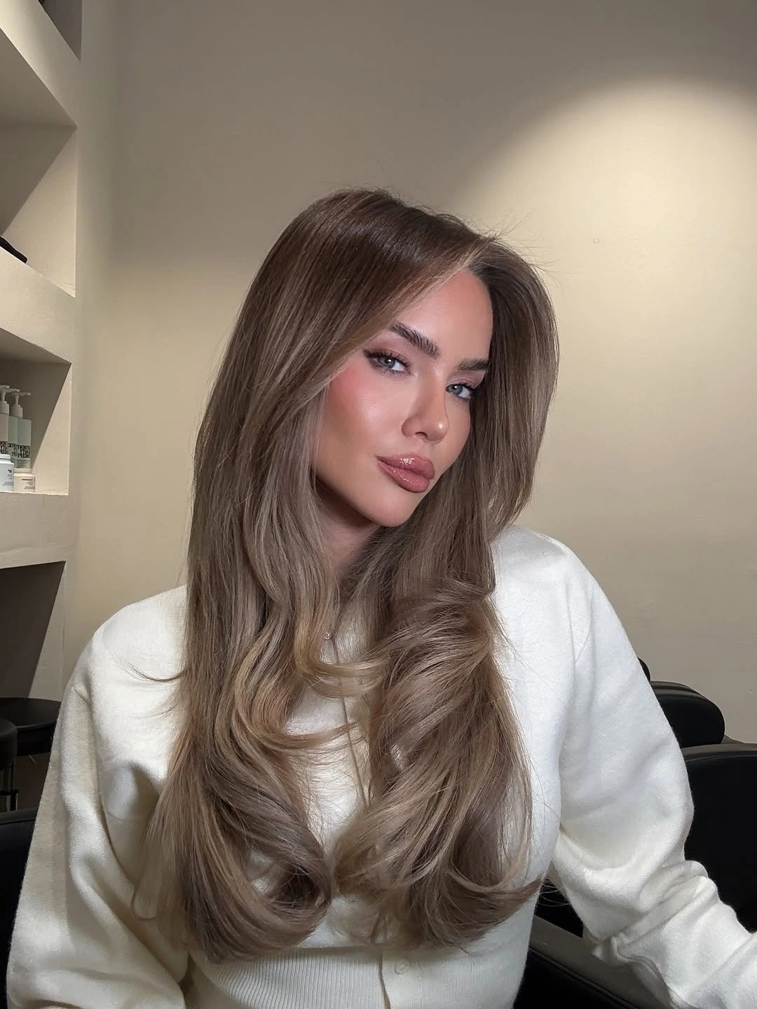 august hairstyles and color ideas 2026 Luxury Mushroom Brunette Blowout With Soft Curtain Layers