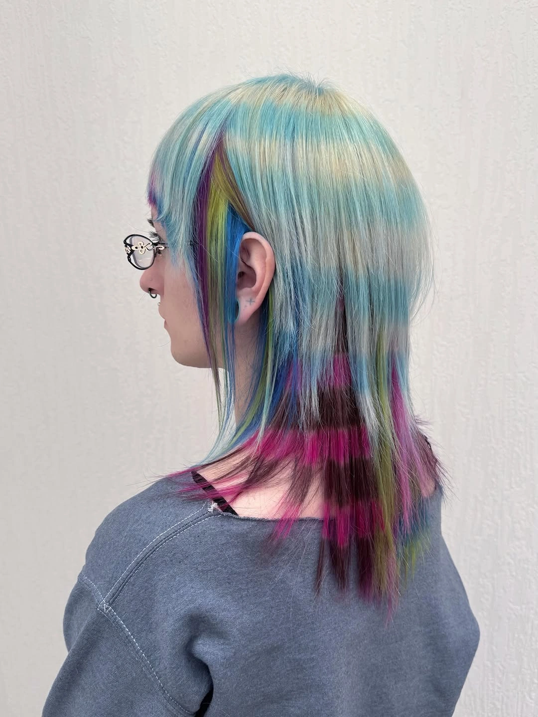 august hairstyles and color ideas 2026 Pastel Layered Shag With Hidden Rainbow Panels