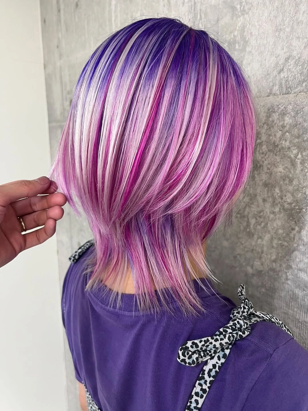 august hairstyles and color ideas 2026 Pastel Layered Short Bob With Lavender Ribbon Highlights