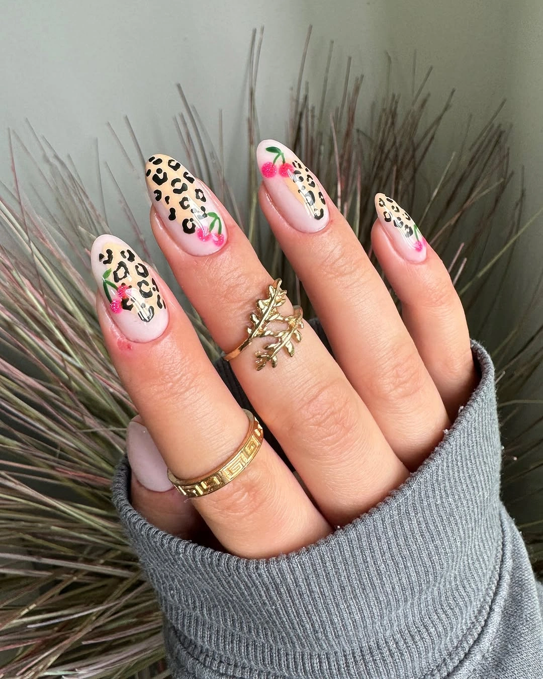 august nails color 2026 Cherry Accents Meet Chic Leopard Prints