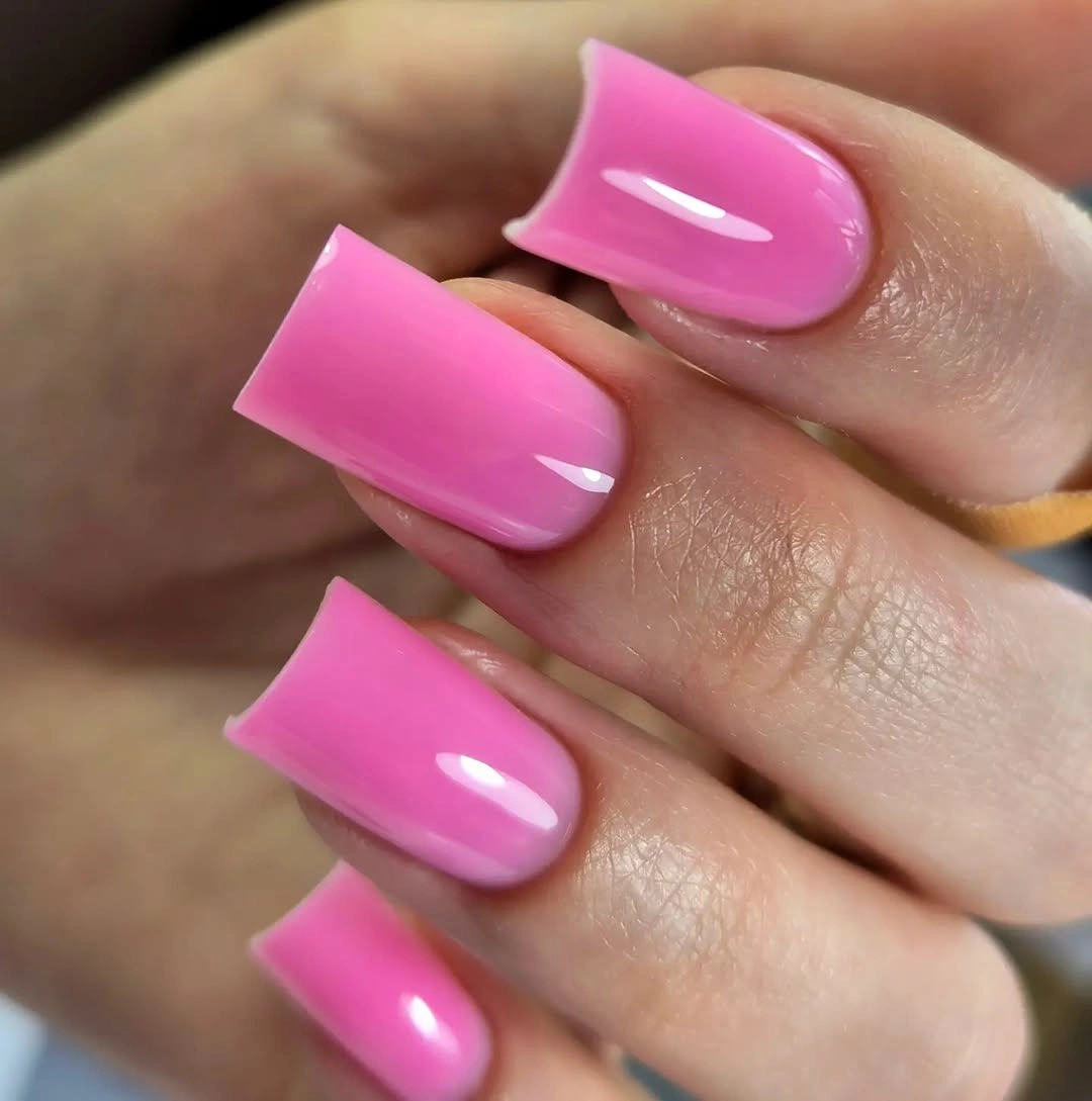 august nails ideas 2026 Glossy Bubblegum Pink for an Effortlessly Chic Finish
