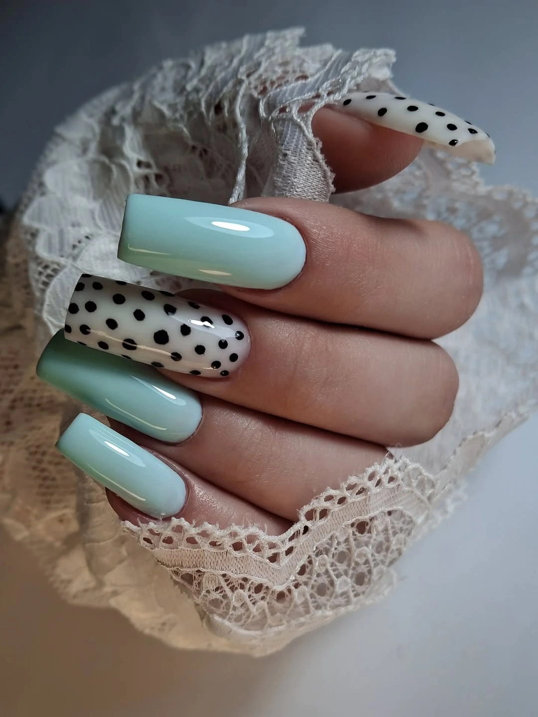 august nails ideas 2026 Soft Blue Polka Dot Nails With Vintage Charm
