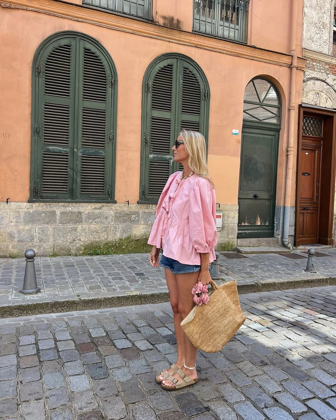 august outfits 2026 Pink Blouse and Denim Shorts with European Charm