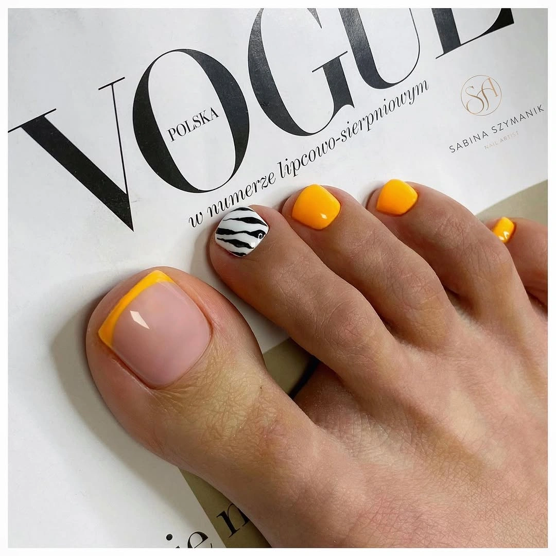 august pedicure nails ideas 2026 Sunny French Tips With a Zebra Accent