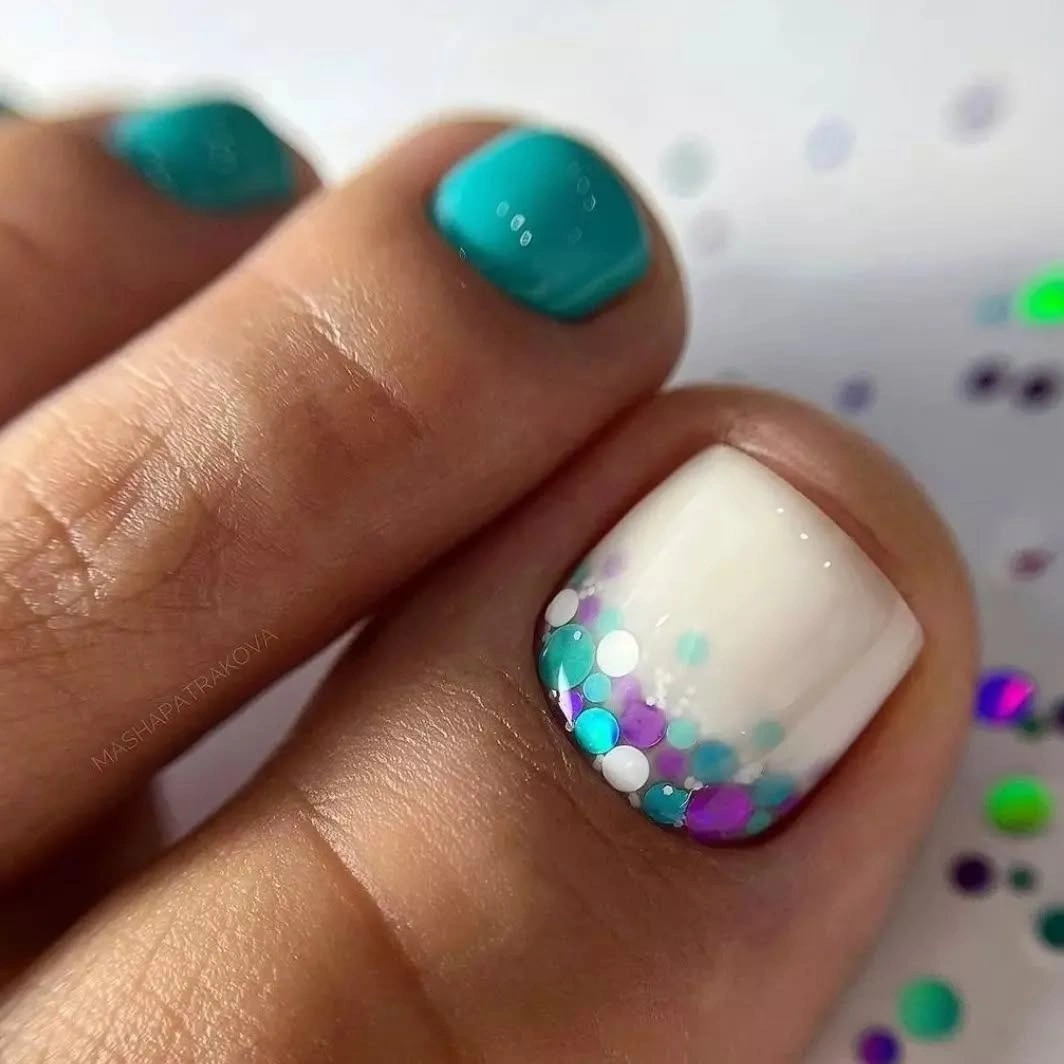 august pedicure nails ideas 2026 Soft White With Mermaid Inspired Confetti