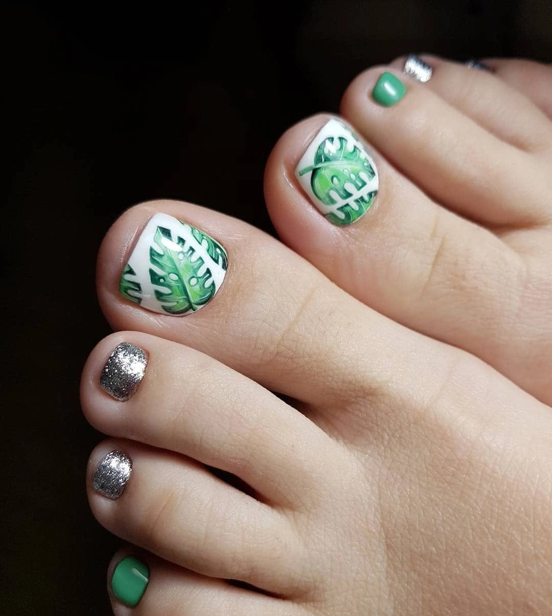 august pedicure nails ideas 2026 Tropical Green Leaves With Sparkling Accents