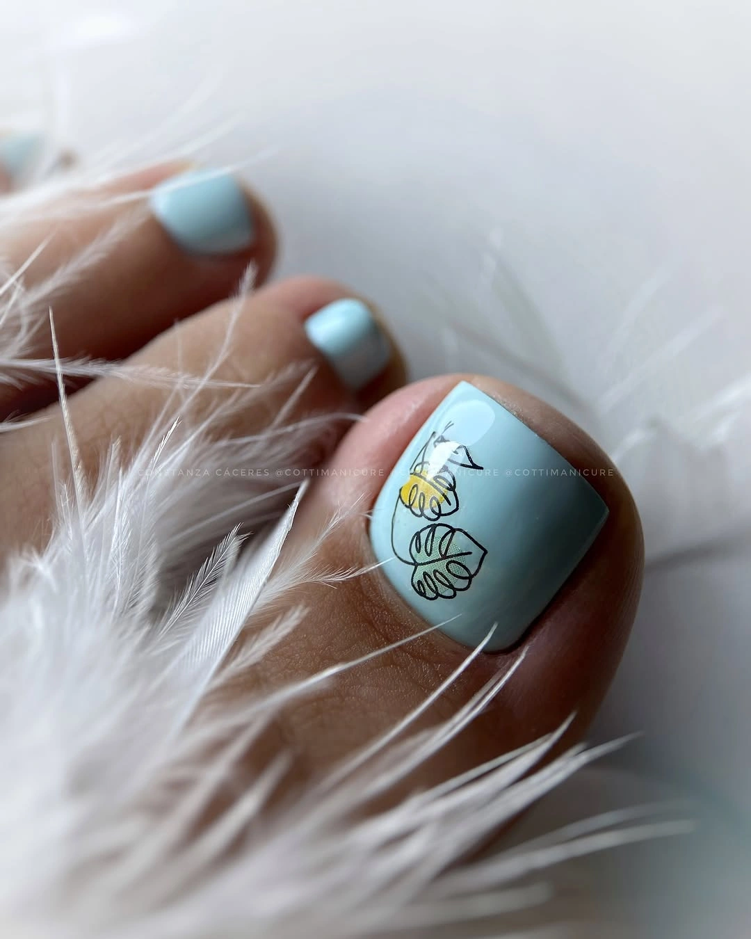 august pedicure nails ideas 2026 Minimal Botanical Art With Soft Blue Elegance