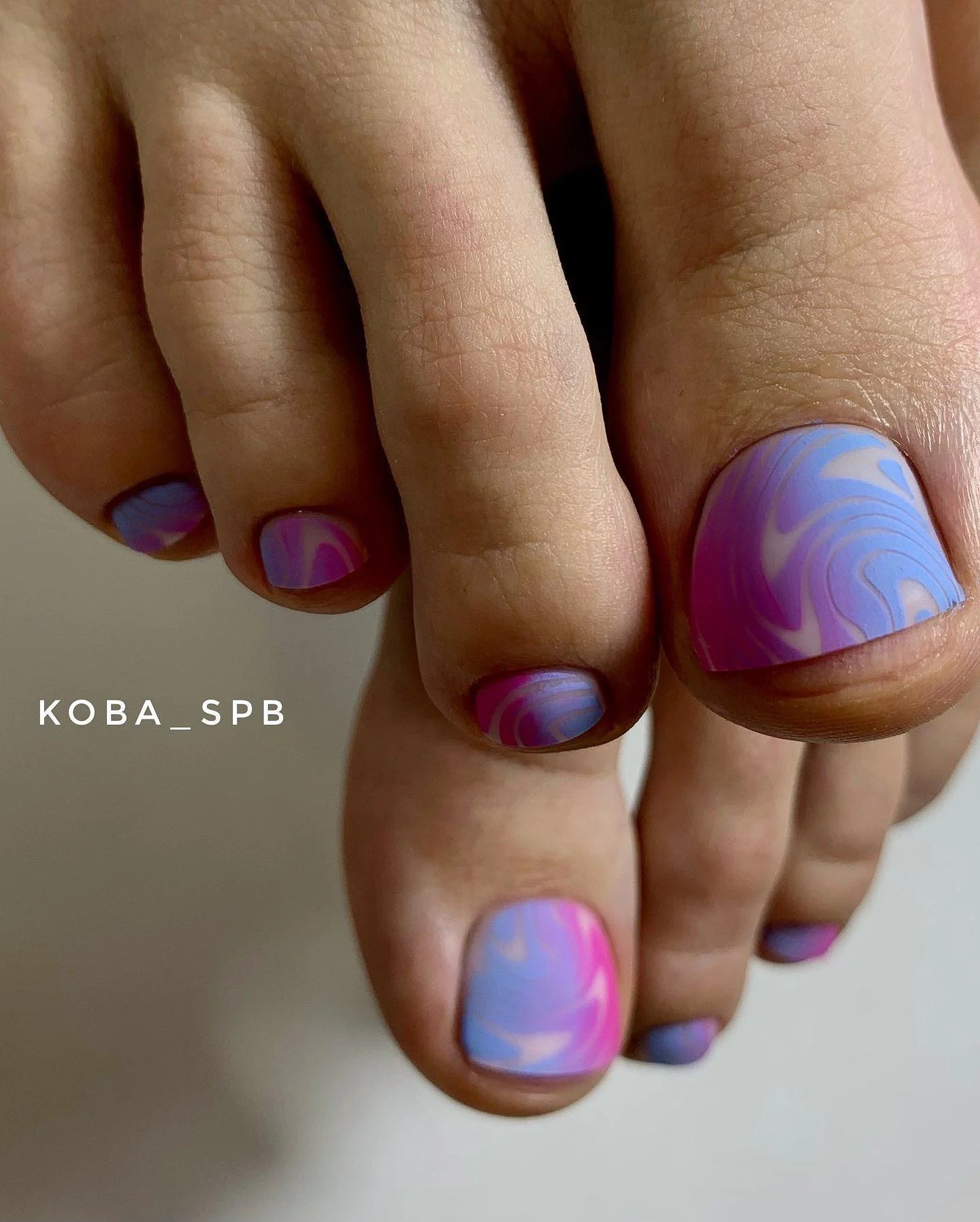august pedicure nails ideas 2026 Dreamy Lavender and Pink Marble Swirls