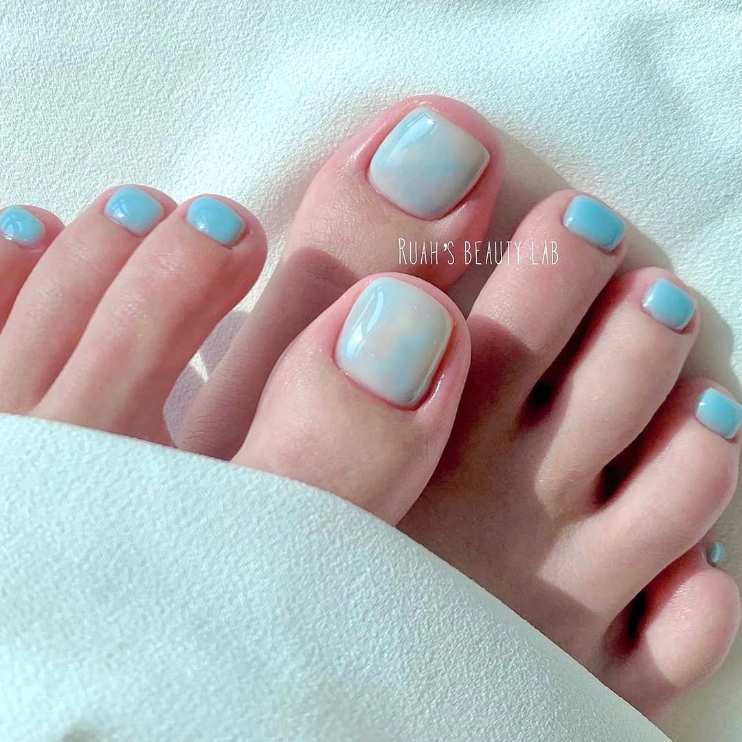 august toe nails 2026 Dreamy Sky Blue Pedicure with Cloud-Like Softness