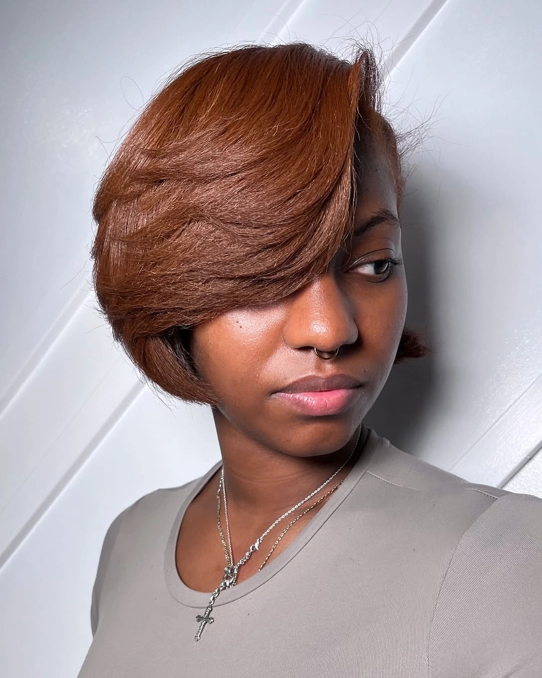 bob hairstyles for black women Copper Asymmetrical Bob With Long Sweep