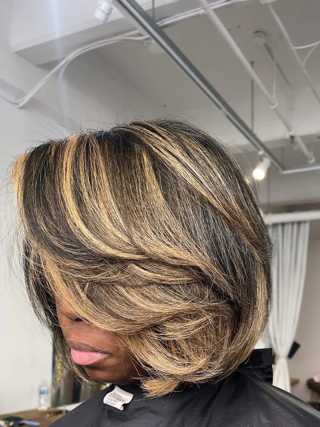 bob hairstyles for black women Layered Side Bob With Blonde Highlights