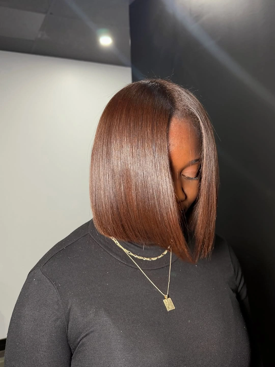bob hairstyles for black women Copper Side-Part Bob With Sleek Ends