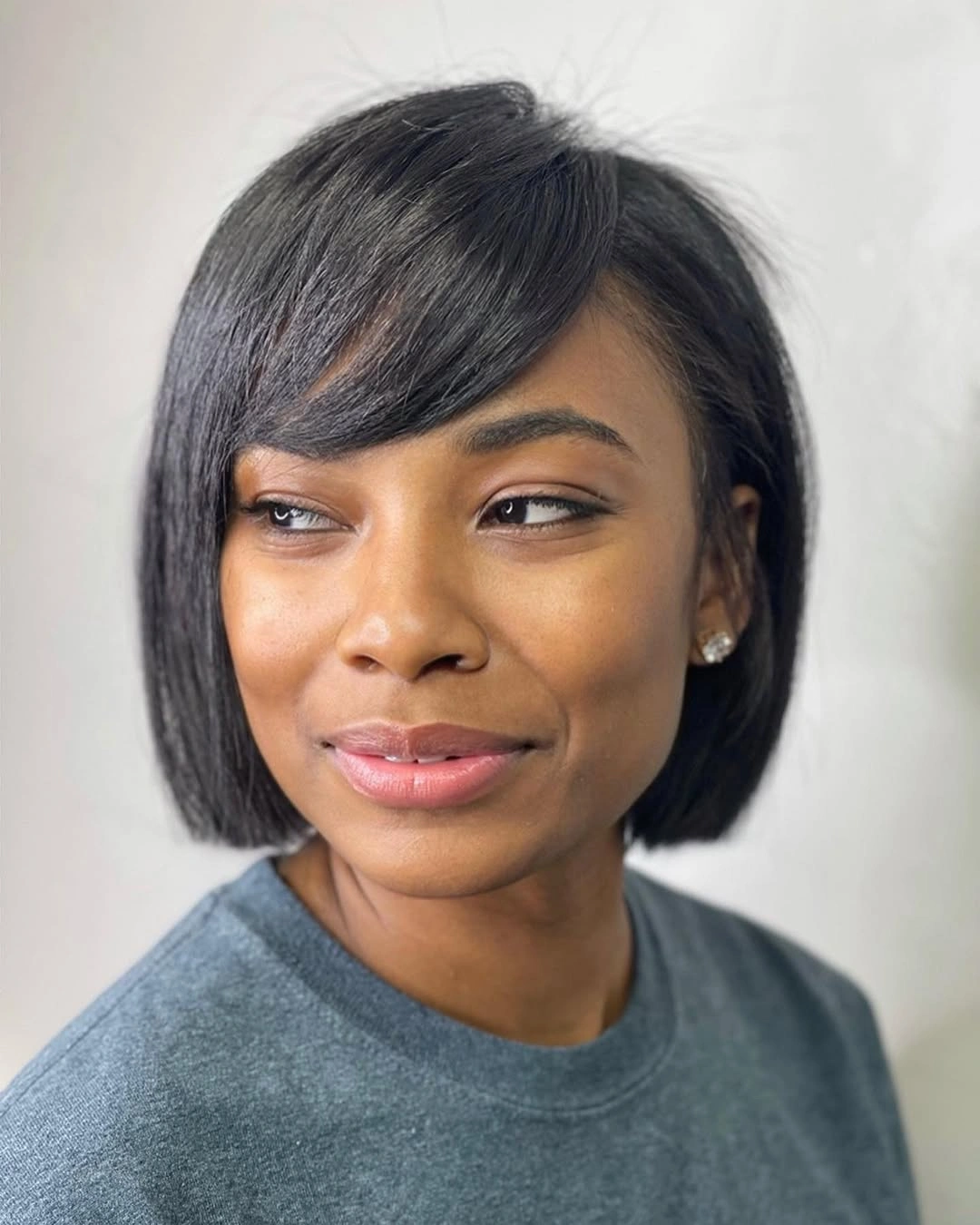 bob hairstyles for black women Short Bob With A Side-Swept Bang