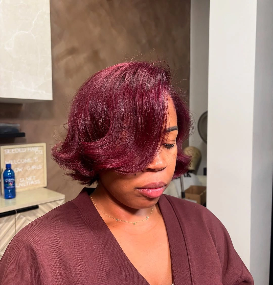 bob hairstyles for black women Deep Red Side-Swept Wavy Bob