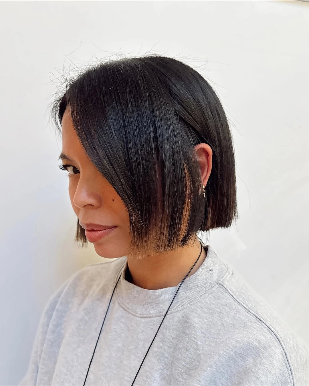 bobbed haircut for women Modern Angled Bob With Face-Framing Length