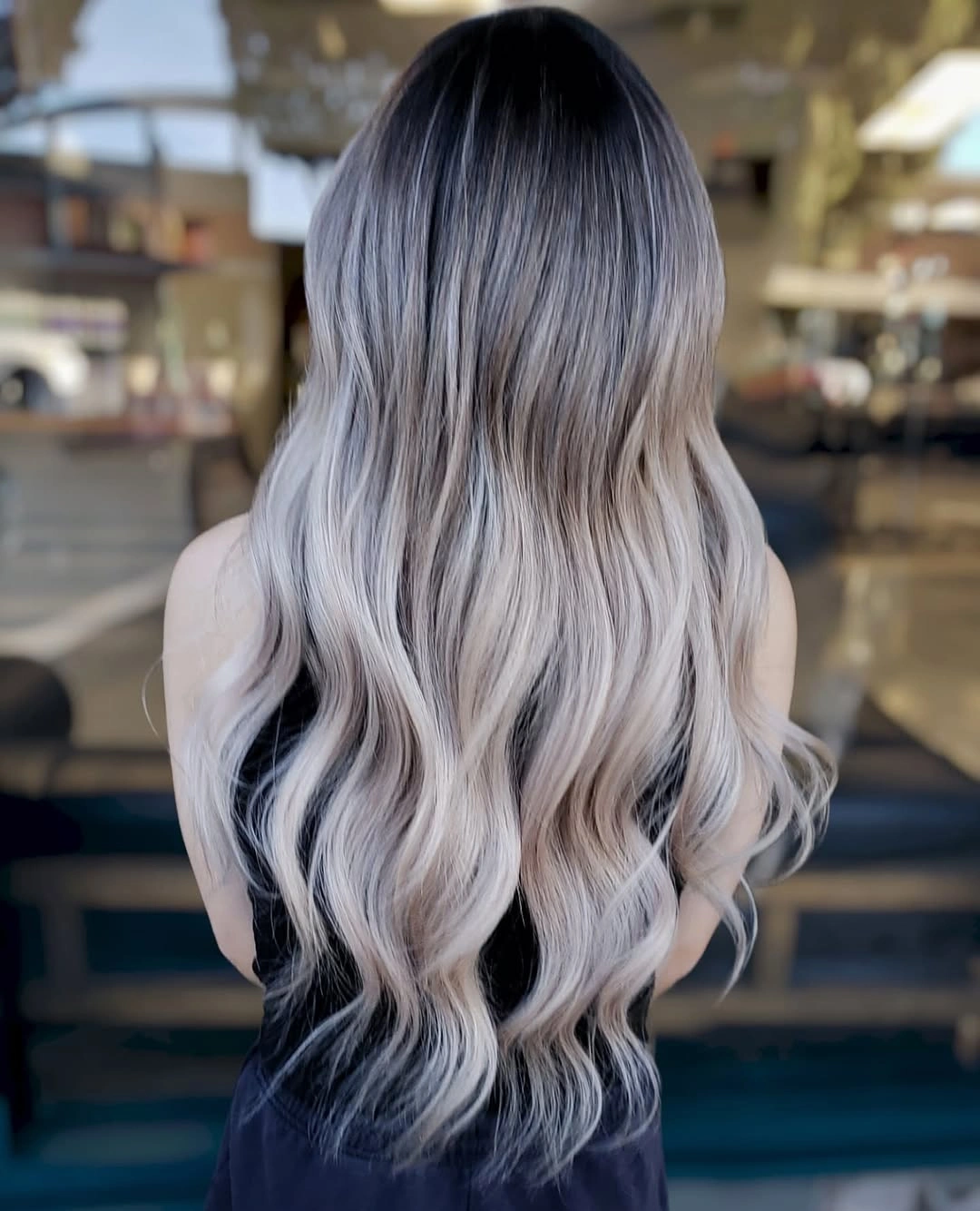 body waves hairstyle Icy Blonde Ombre with Flowing Luxury Waves