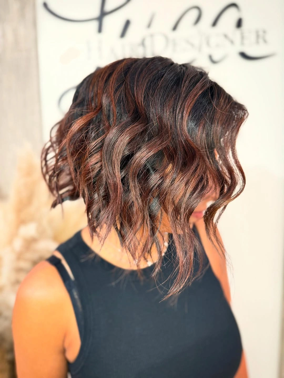 body waves hairstyle Textured Chocolate Bob with Modern Body Waves
