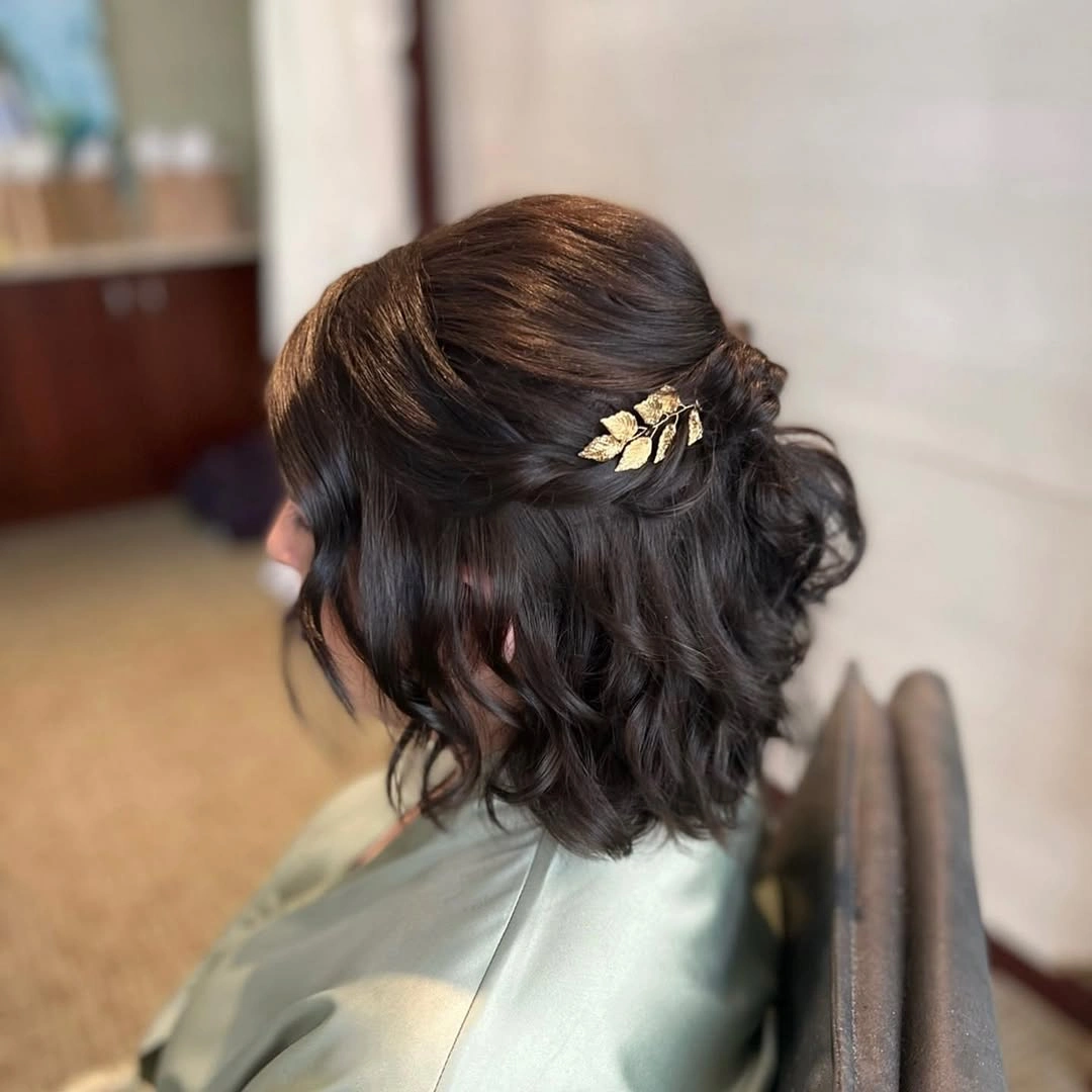 bridesmaid hairstyling Soft Wavy Bob with Romantic Twisted Detail