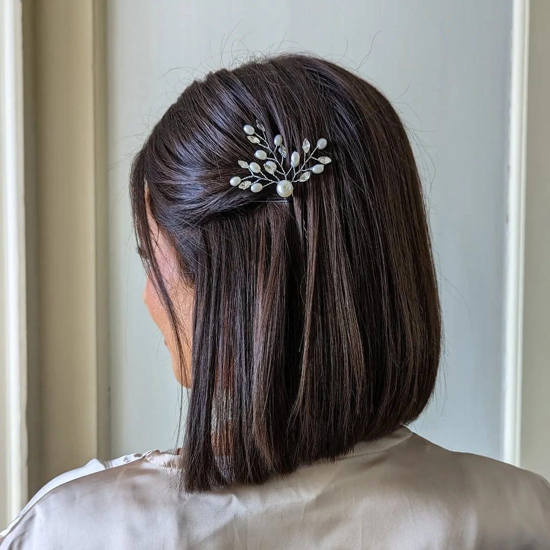 bridesmaid hairstyling Minimalist Half-Up Bob with Delicate Pearl Accent