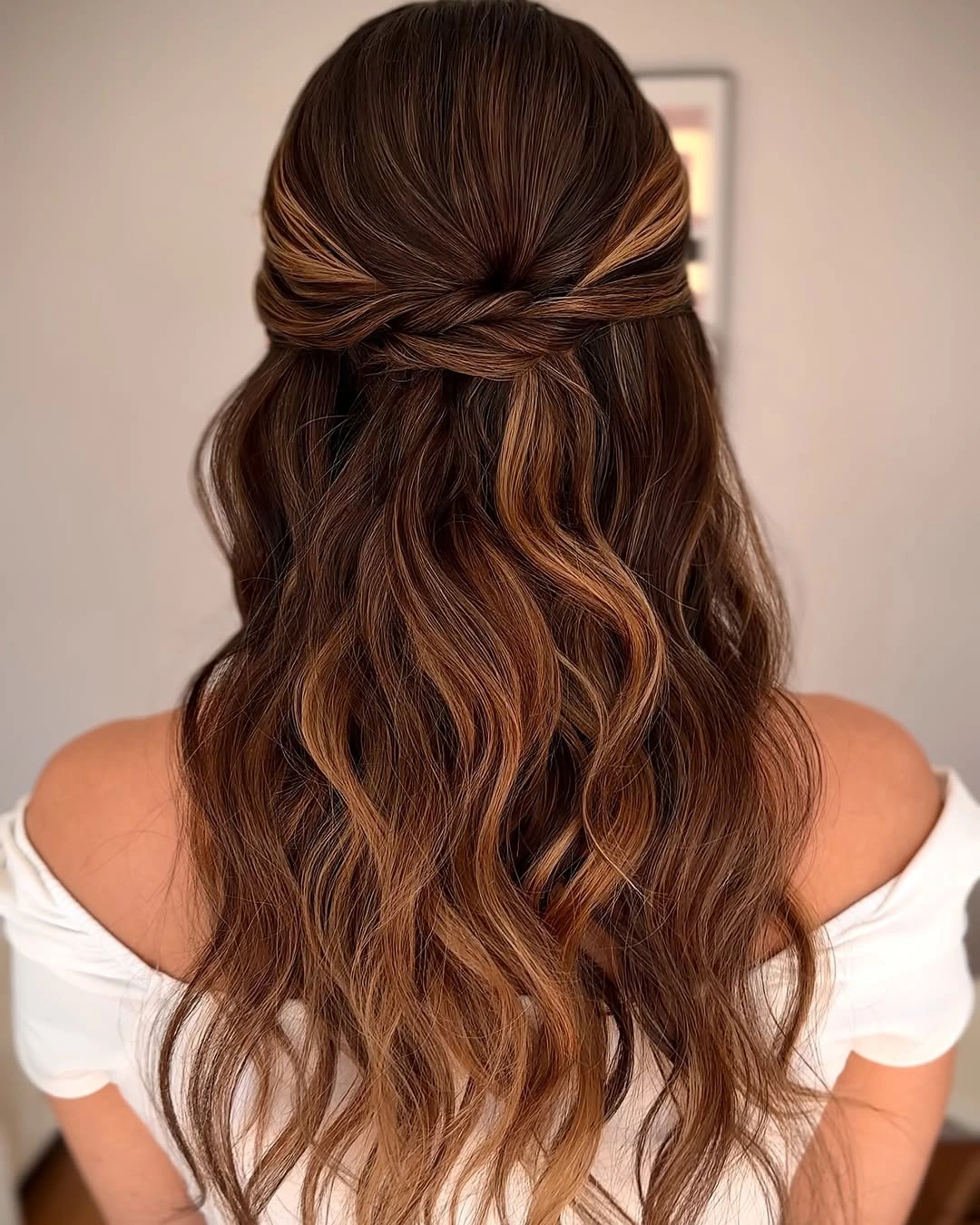 bridesmaid hairstyling Warm Brunette Half-Up Waves with Seamless Twisted Detail