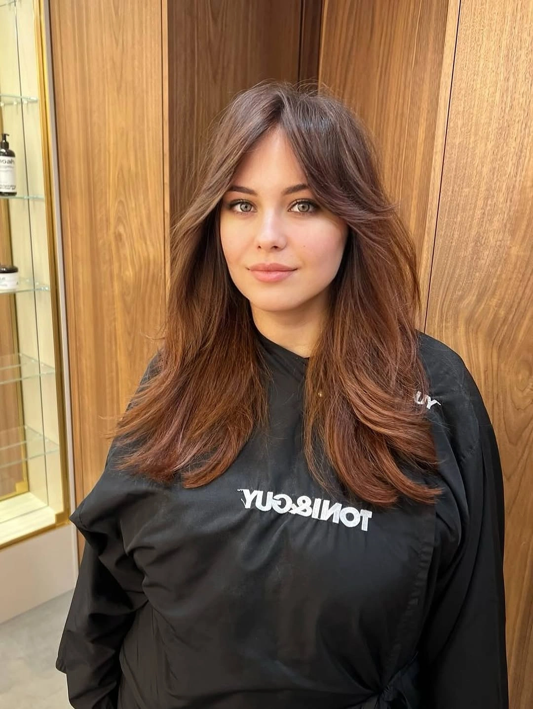 chestnut brown hair color Centered Curtain Layers With Warm Chestnut Volume