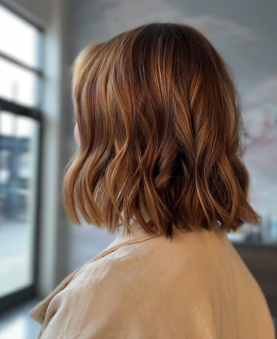 chestnut brown hair color Wavy Chestnut Lob With Light Movement