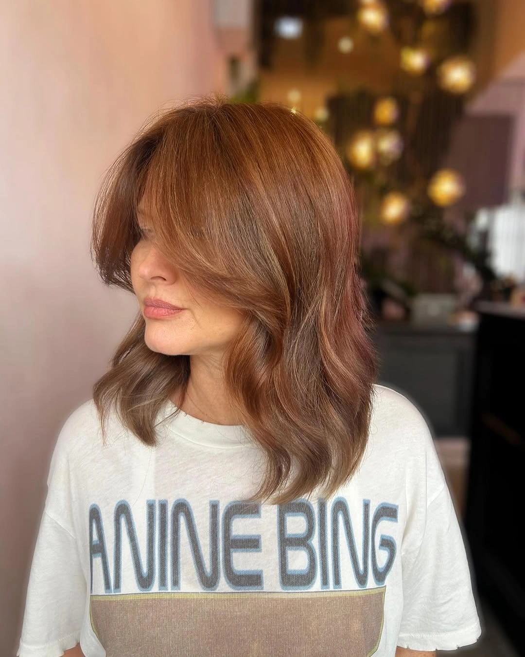 chestnut brown hair color Soft Lob With A Sweeping Curtain Fringe