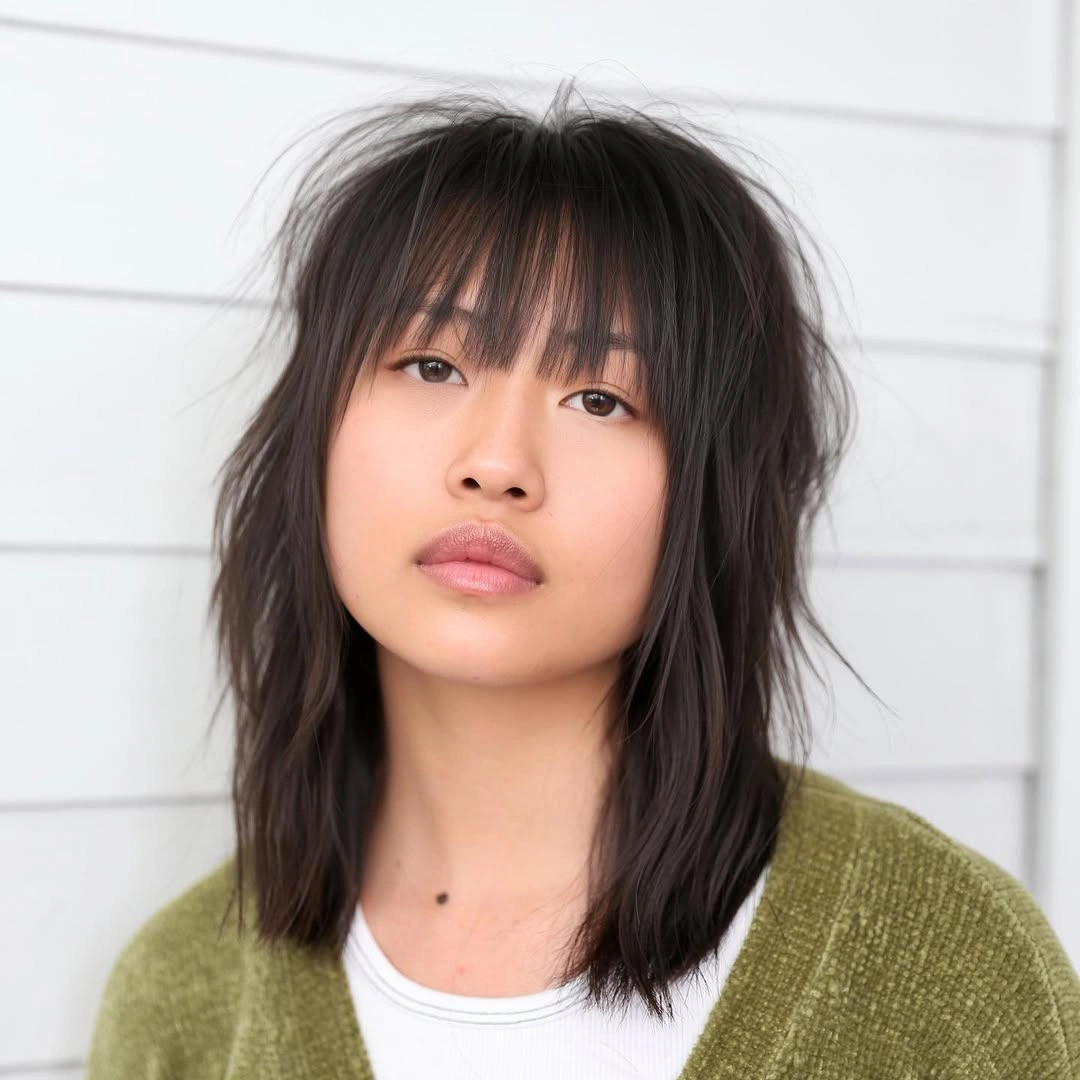 choppy medium layered hair Feathered Midnight Layers With Airy Fringe
