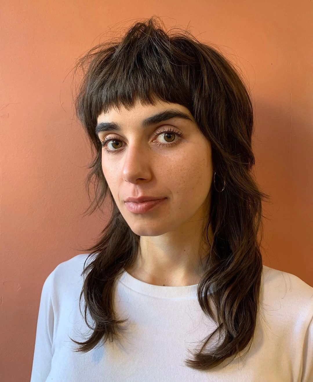 choppy medium layered hair Soft Espresso Butterfly Shag With Baby Fringe