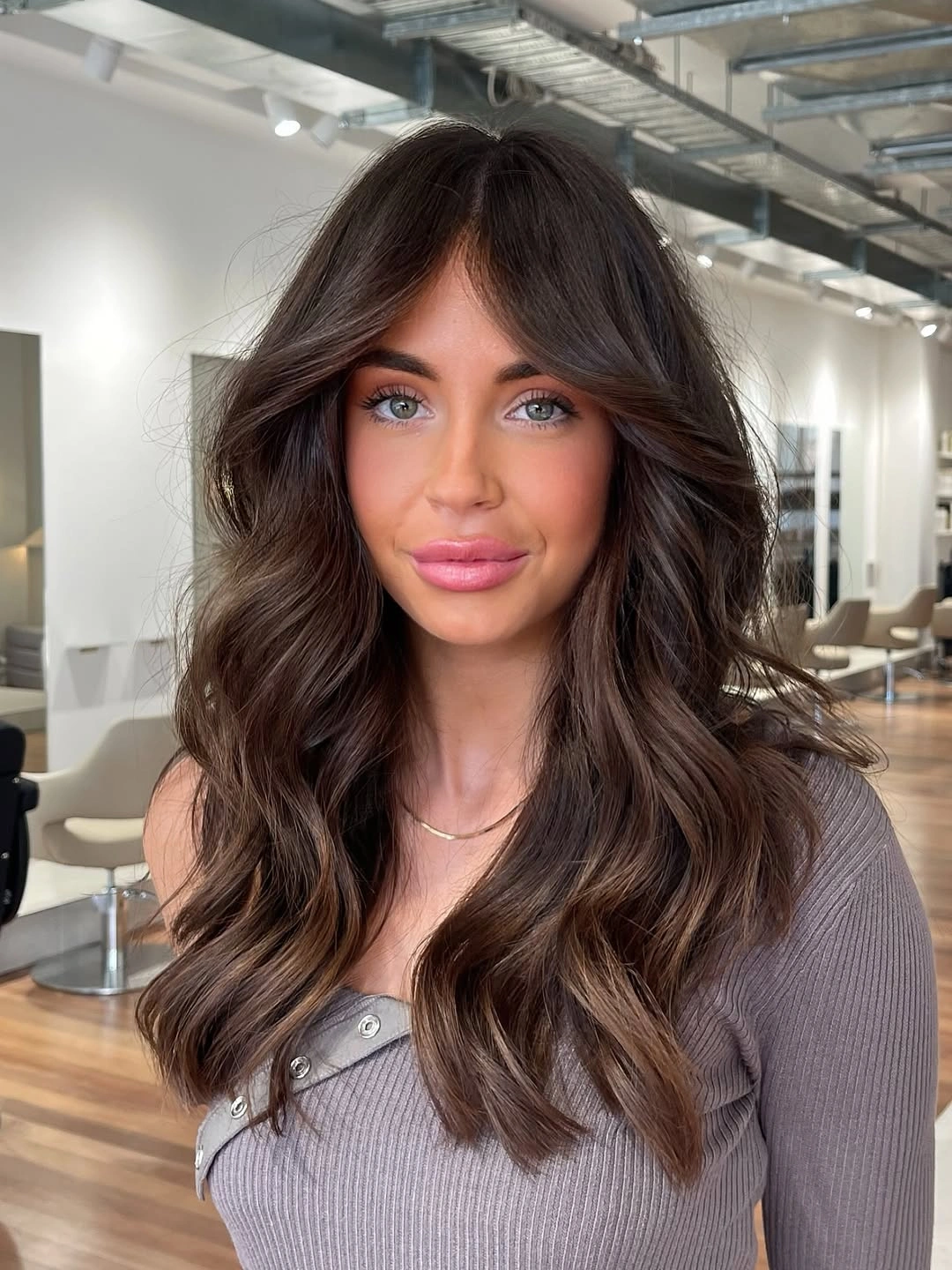 dimensional brunette hair color Long Brunette Waves With Bright Face Frame