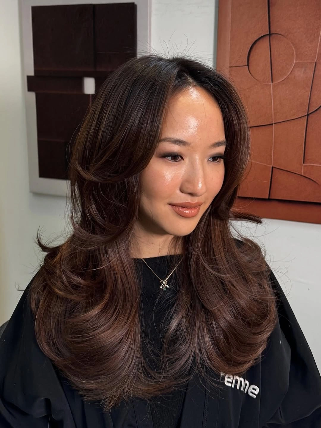 dimensional brunette hair color Voluminous Brunette Layers With Glossy Ends