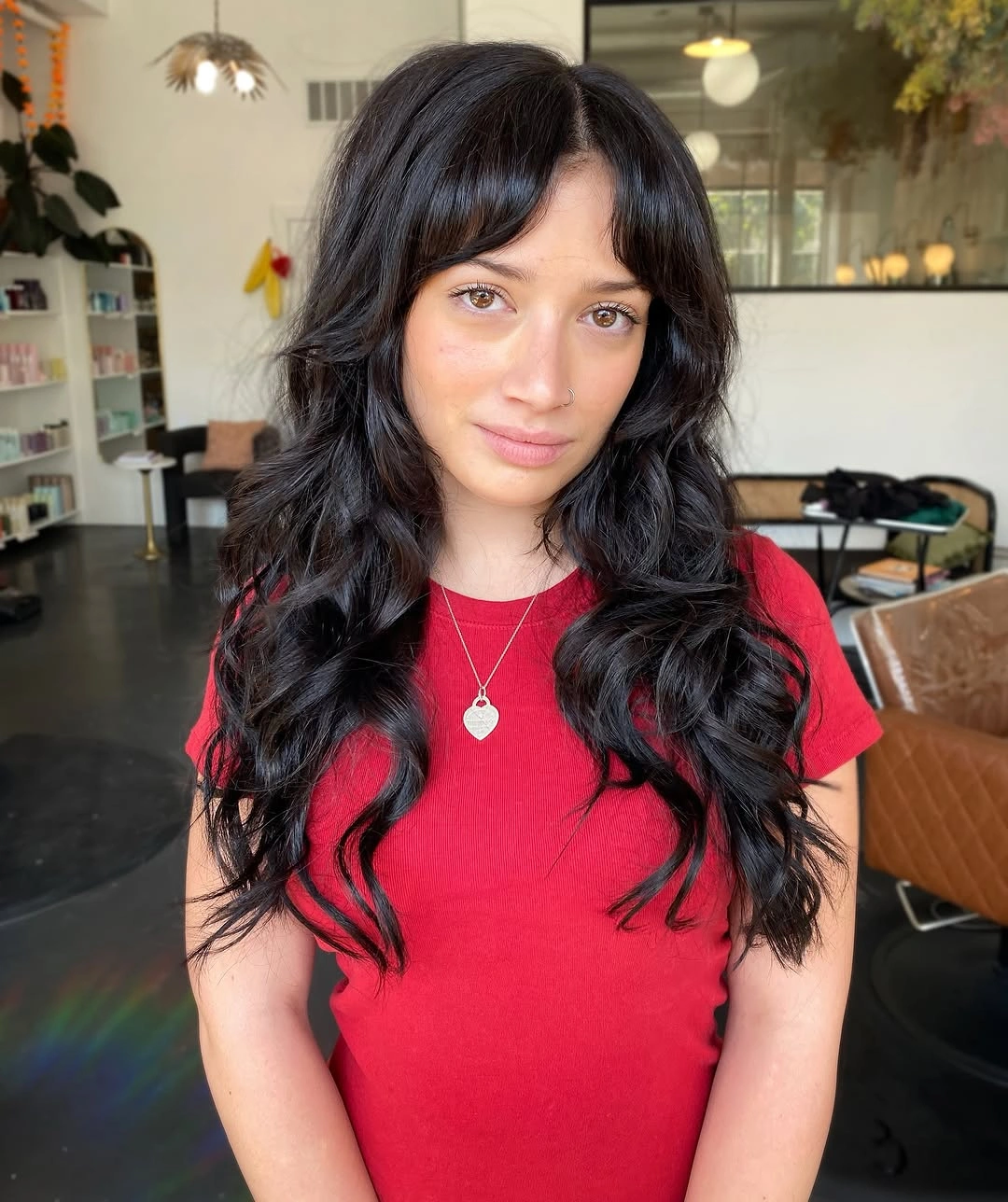 dimensional brunette hair color Dark Wavy Brunette Hair With Soft Bangs